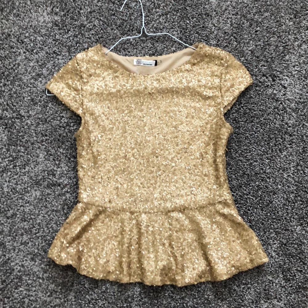 Sequence peplum top